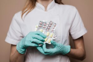 person holding medicines